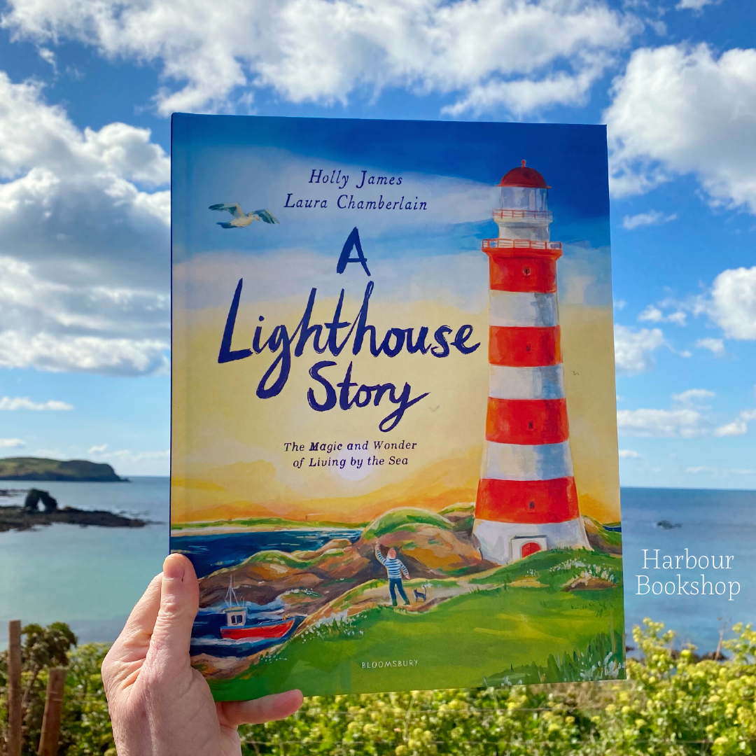A Lighthouse Story by Holly James and Laura Chamberlain with the Harbour Bookshop at South Milton Sands in Devon.